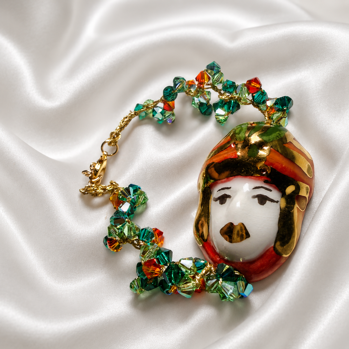 Handmade Sicilian Testa di Moro bracelet with hand-painted Caltagirone ceramic and green orange Swarovski crystals