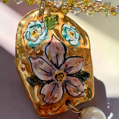 Mediterranean Bloom – Sicilian Ceramic Pendant & Pearl Crochet Necklace
