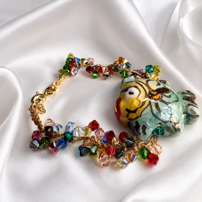Sicilian ceramic fish bracelet with colorful Swarovski crystals and handcrafted gold-tone crochet details