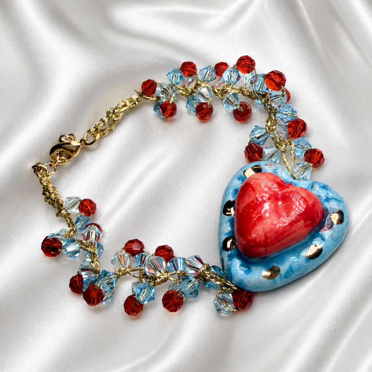Handmade Sicilian Sacred Heart bracelet with Caltagirone ceramic and red and blue Swarovski crystals