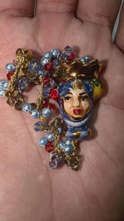 Video showing Moor’s Crown handmade Sicilian Testa di Moro bracelet with Swarovski crystals and blue Majorca pearls