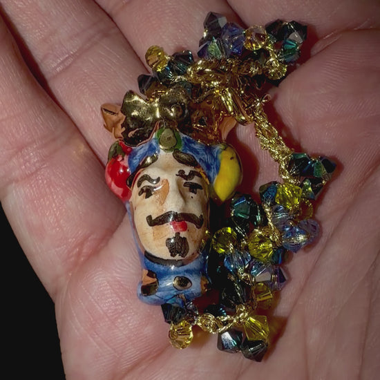 Video showing handmade Sicilian Testa di Moro Swarovski bracelet held in hand to show size and craftsmanship