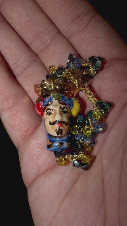 Video showing handmade Sicilian Testa di Moro Swarovski bracelet held in hand to show size and craftsmanship