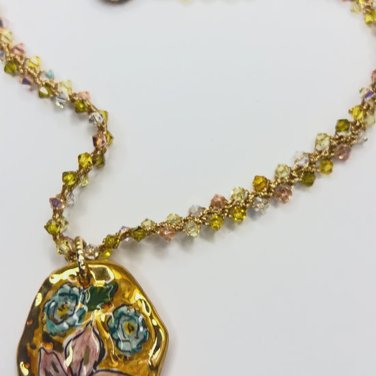 Video showing handmade Sicilian ceramic floral pendant, pearl and Swarovski crystal necklace