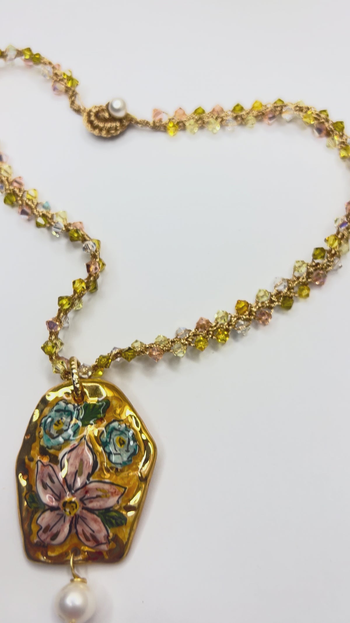 Video showing handmade Sicilian ceramic floral pendant, pearl and Swarovski crystal necklace