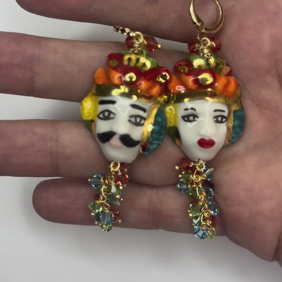 Video showing handmade Sicilian Moor’s Head earrings in hand-painted Caltagirone ceramic with Swarovski crystal details