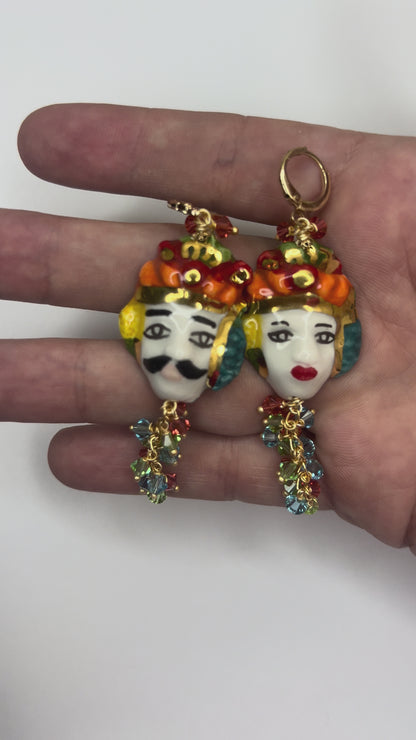 Video showing handmade Sicilian Moor’s Head earrings in hand-painted Caltagirone ceramic with Swarovski crystal details